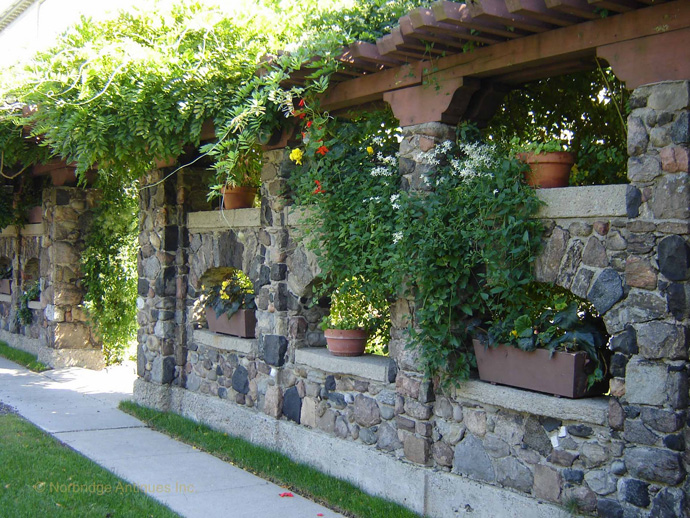 Stone and wood pergola