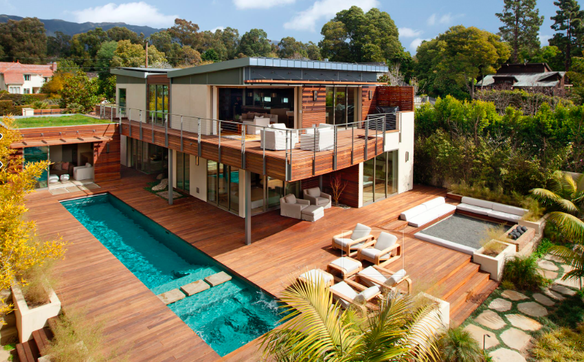 Top 15 Solar Powered Home Designs, Plus their Costs in 2022 1. The Solar Farmhouse design features large windows and a sloped roof to maximize natural light and solar energy collection.
2. The Eco Oasis design includes a green roof, solar panels, and rainwater harvesting system to create a sustainable and energy-efficient home.